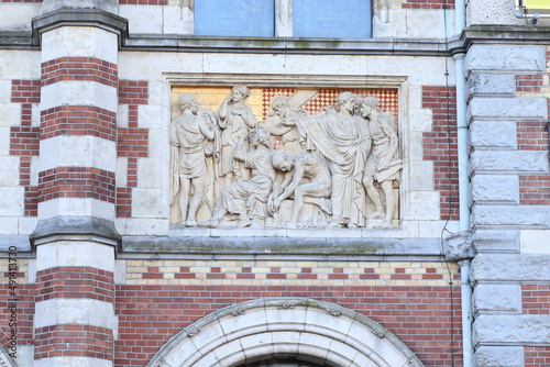 Amsterdam Rijksmuseum Facade Close Up with Relief Depicting a Sculptor and Other Artists, Netherlands photo