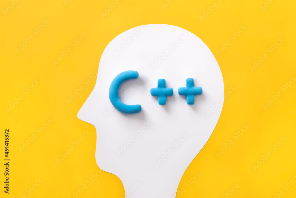 C++ programming language sign inside a humans head. Concept of programming learning, language coding software technology.