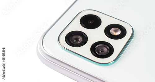 Camera of a modern smartphone close-up. Modern smartphone camera lens isolated.