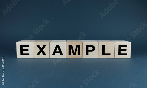 Example. The cubes form the words Example.