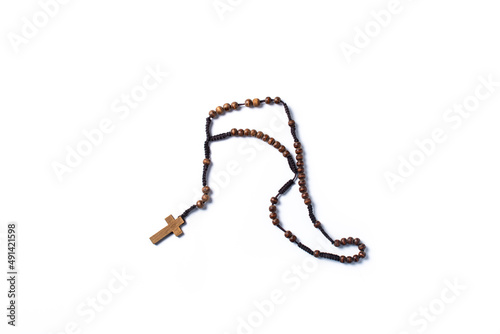 Rosary cathloic cross isolated on white background photo
