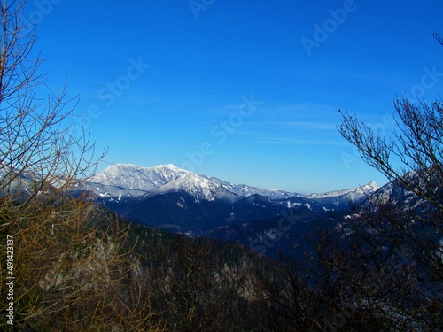 Scenic view of mountains in Karavanke mountain range above Jezersko in Gorenjska region of Slovenia in winter with the peaks covered in snow