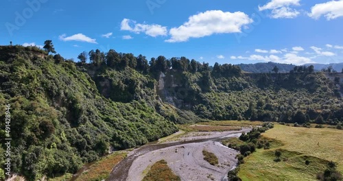 Flying over Oroua River Apiti reserve Manawatu steep cliff and grasslands-NZ photo