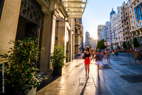 Pedestrians shopping in the city II