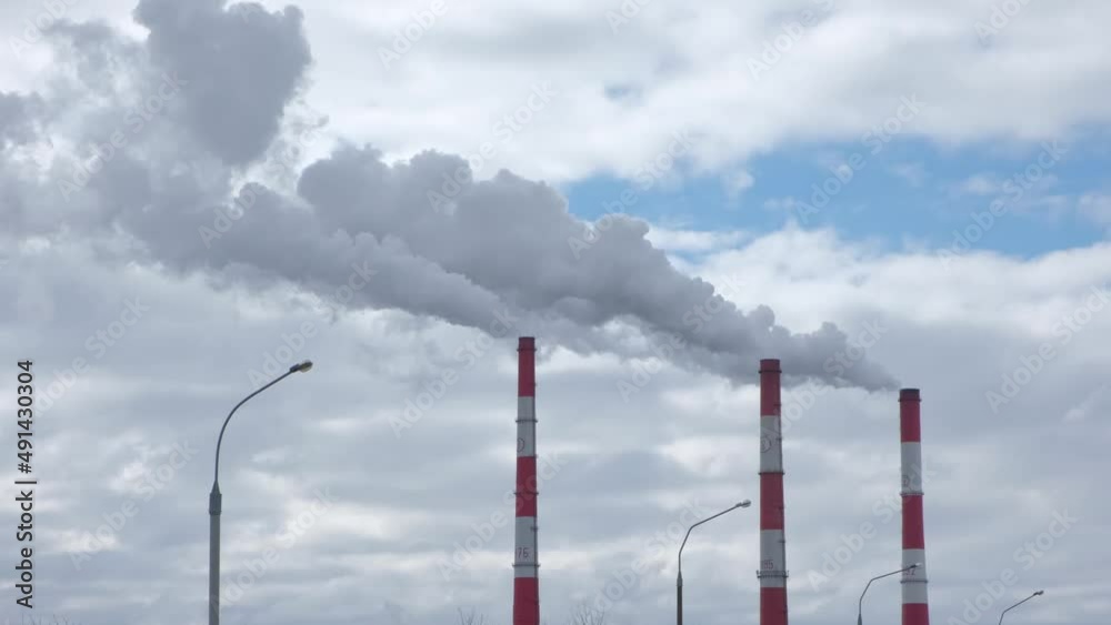 Power station electrical factory Chimneys of a coal power station causing global warming Ecology, atmospheric emissions, environmental pollution. Ecological disaster Power station electrical factory Chimneys of a coal power station causing global warming Ecology, atmospheric emissions, environmental pollution. Ecological disaster