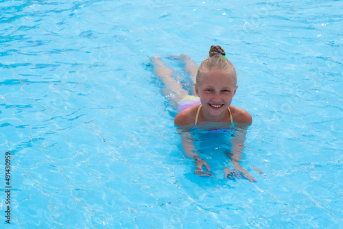 girl swimming in the pool