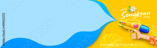 Songkran festival thailand, water gun in hands, empty space blue and yellow background, Eps 10 vector illustration