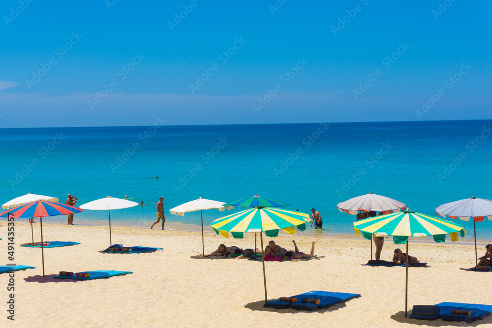 Umbrella beach chair sea beach against blue sky