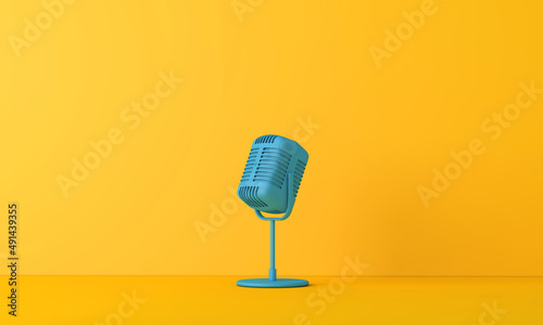 Vintage style microphone against a plain bright yellow background. 3D Rendering photo