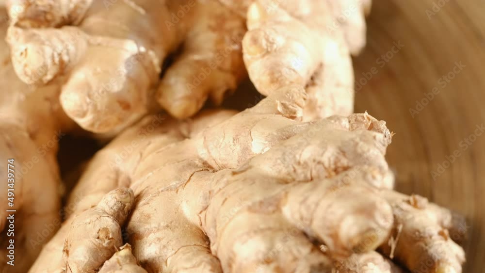 Whole ginger root on close up rotating 4K Whole ginger root on close up rotating 4K