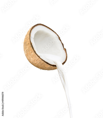 Coconut milk pouring isolated on white background.