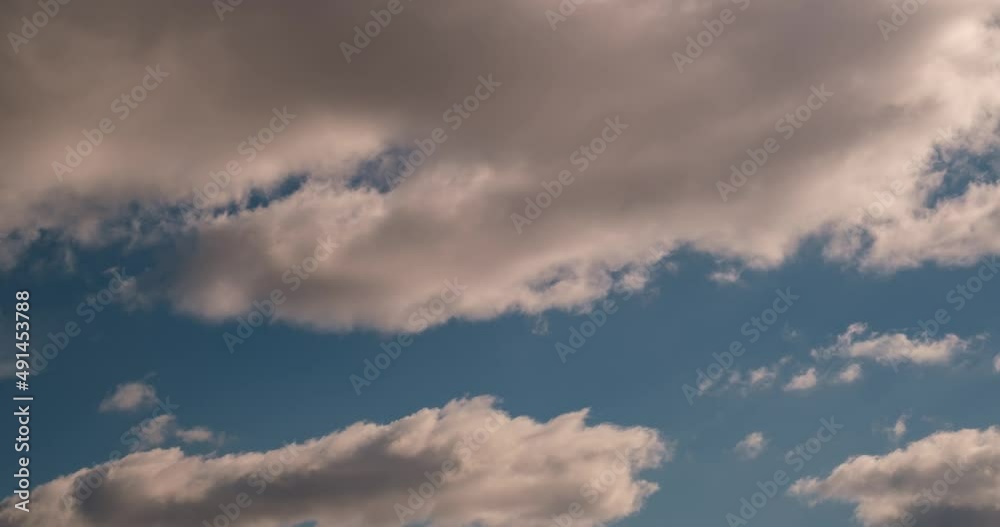 Timelapse of blue sky background with tiny striped clouds. Clearing day and good windy weather Timelapse of blue sky background with tiny striped clouds. Clearing day and good windy weather