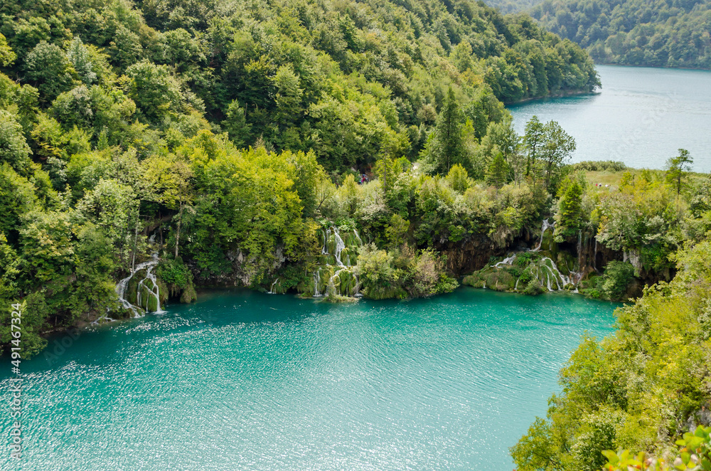 Panoramic View of Plitvice Lakes National Park in Croatia. Beautiful Natural Waterfalls, with Green Forests and Emerald Waters on a Sunny Day of Autumn.