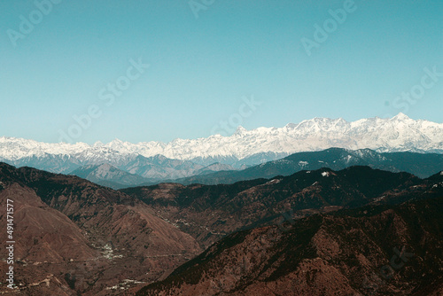 landscape with with beautiful snow peaks and greenery 