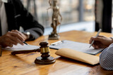 Client was listening to a lawyer advising on an embezzlement case, explaining the details of the proceeding and gathering evidence to file a lawsuit against the defendant. The concept of litigation.