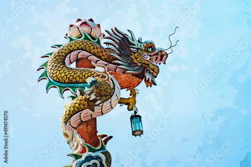 Chinese dragon in front of blue sky photo