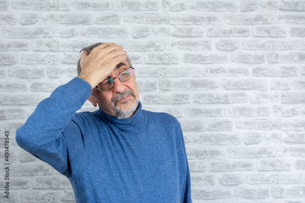 Mature man suffering from cold on white background Mature man suffering from cold on white background
