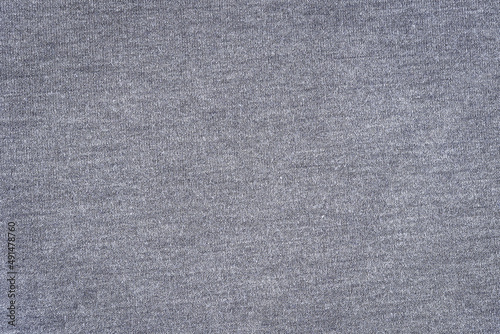 The texture of the grey fabric. Grey cotton texture. Denim