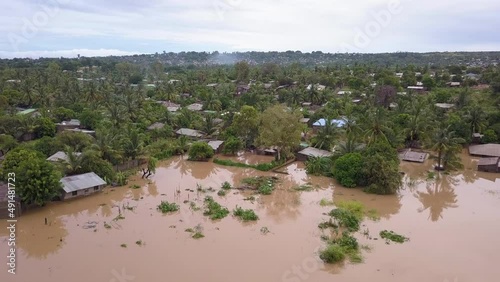 Aerial overhead flooded village in poor country after a monsoon. photo