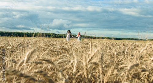 beautiful girls in wheat field
