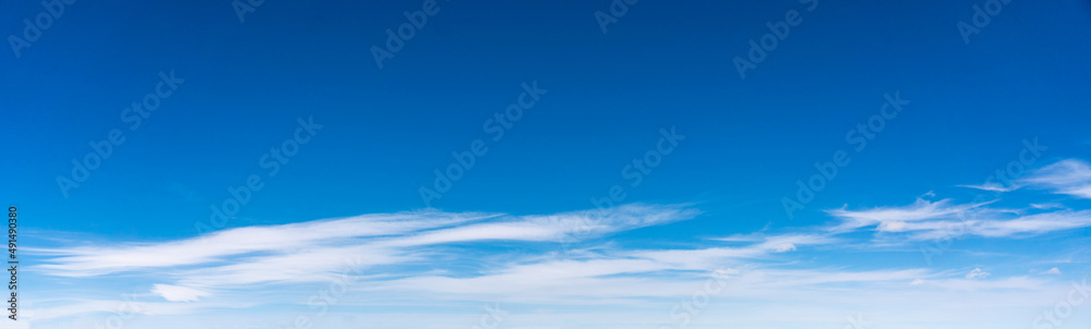 Panorama of blue sky with white foggy clouds Panorama of blue sky with white foggy clouds