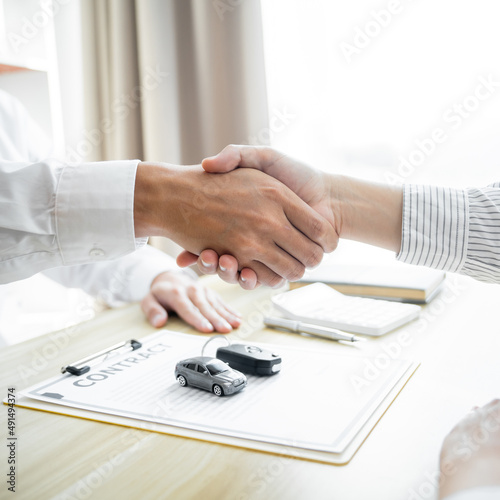 Businessman agent Handshake. Car loan insurance. Salesman Automobile Vehicles Concept