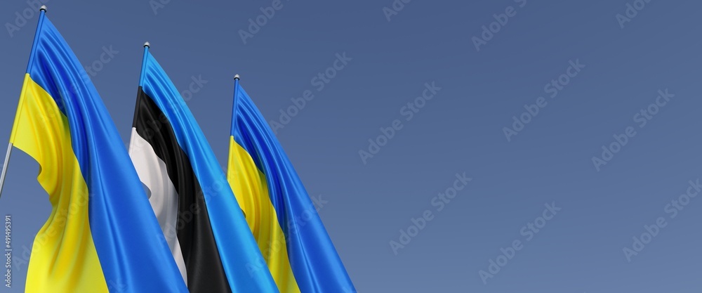 Flags of Estonia and Ukraine on flagpoles on side. Flags on a blue ...