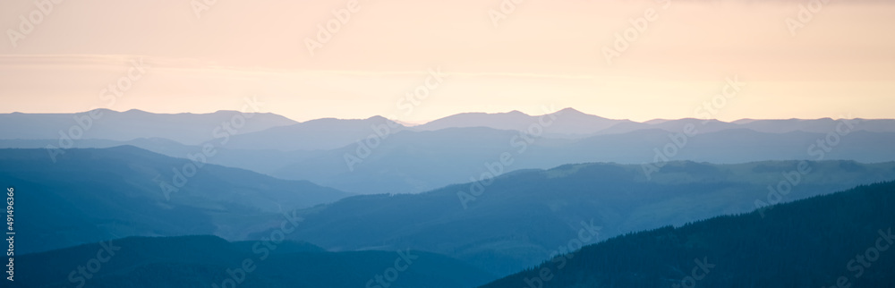 Panoramic view of mountains. Scenic mountain landscape.  Carpathian, Ukraine. Banner. Copy space.