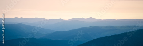 Panoramic view of mountains. Scenic mountain landscape.  Carpathian, Ukraine. Banner. Copy space. © Kulbabka