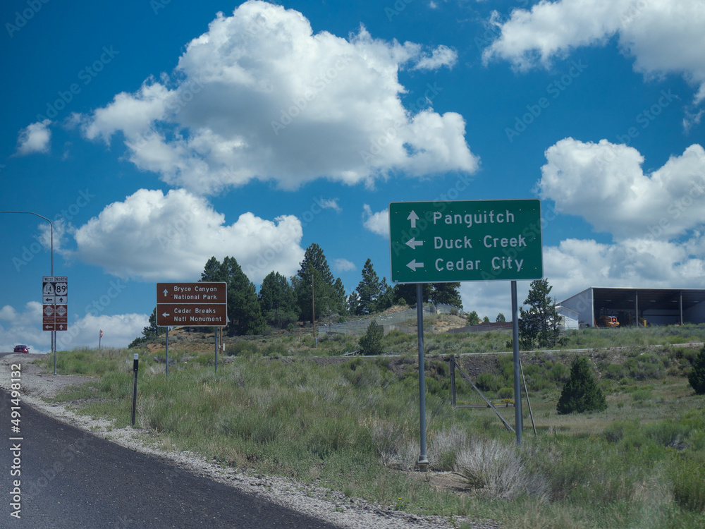 Roadside sign with directions to Bryce Canyon National Park, Panguitch