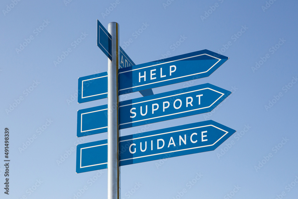 Fototapeta premium Help, support, guidance word on signpost isolated on sky background