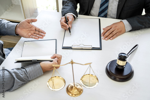 Fotografia Consultation and conference of Male lawyers and professional businessman working and discussion having at law firm in office
