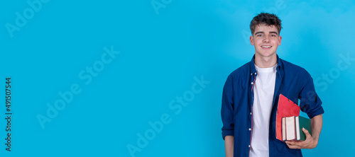 teen student with books isolated on background with copy-space