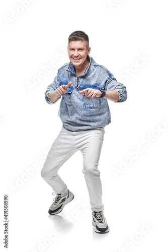handsome young man in denim jacket with fist up