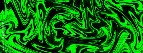 Green abstract pattern on black background, Dispersion oil on water.