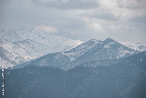 snow covered mountains in autumn © vardan
