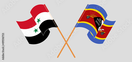 Crossed and waving flags of Syria and Eswatini