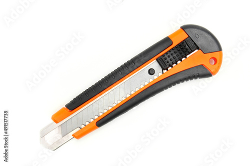 Office knife with replaceable blades on white background