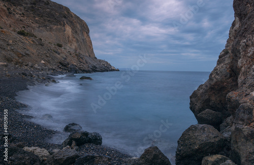 Hermoso paisaje natural de la playa de Aguadulce, ubicada en Almería, España con rocas de formación única, (Paisaje marino al atardecer ,Enfoque suave debido a la toma de larga exposición.) photo