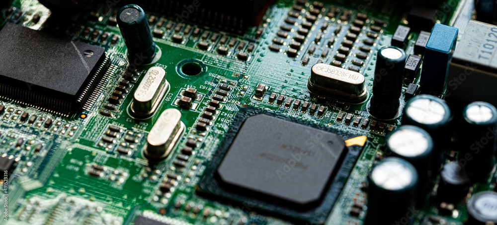 Macro Close up of components and microchips on PC circuit board Macro Close up of components and microchips on PC circuit board