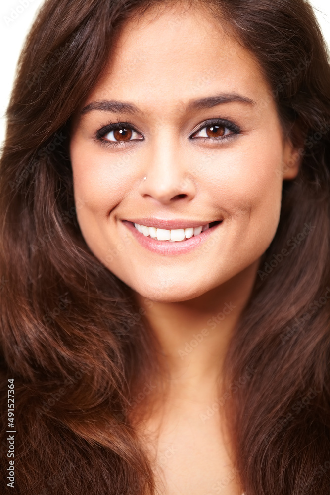Youthful beauty. Studio portrait of a beautiful smiling brunette. Youthful beauty. Studio portrait of a beautiful smiling brunette.