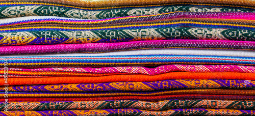 Lliclla - traditional woven blanket worn by women in the Peruvian Andes.
