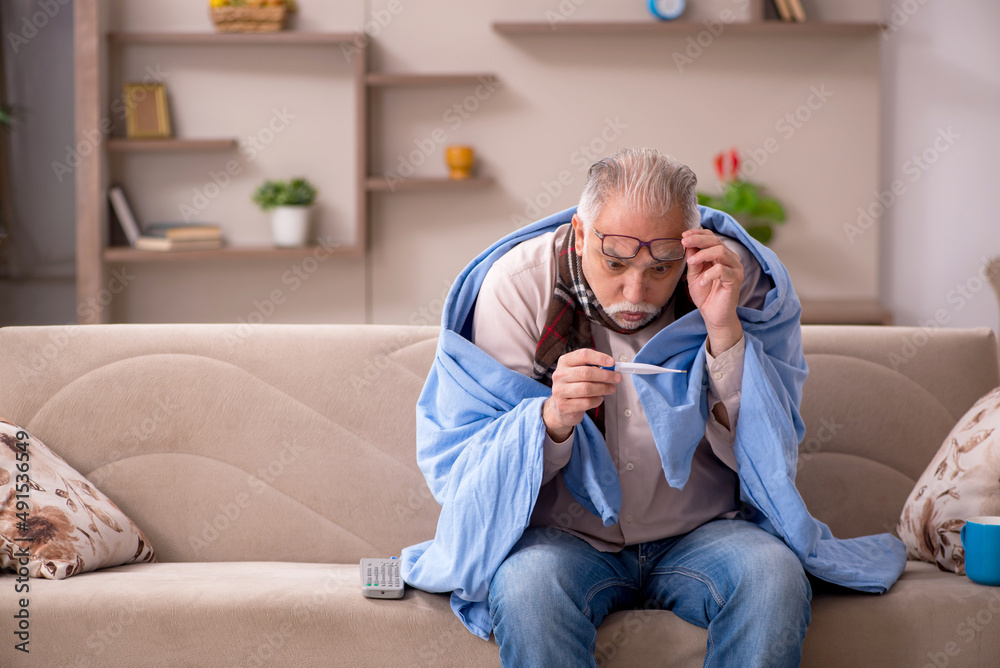 Old man suffering at home Old man suffering at home
