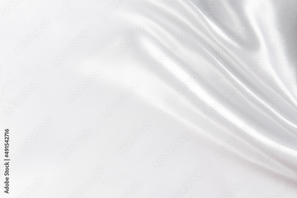 Abstract white silk fabric texture background. 