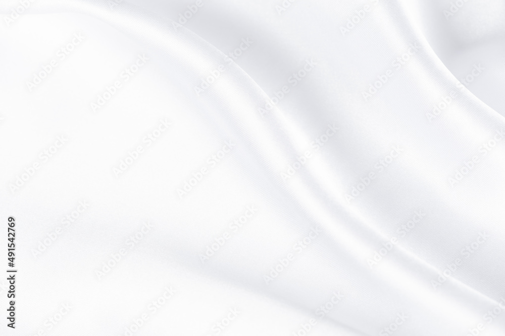 Abstract white silk fabric texture background. Creases of satin Abstract white silk fabric texture background. Creases of satin