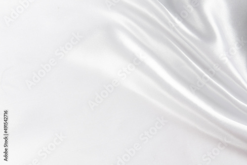 Abstract white silk fabric texture background. 