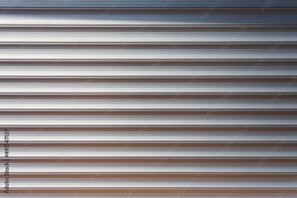 Close-up silver metal profile of an industrial building Close-up silver metal profile of an industrial building
