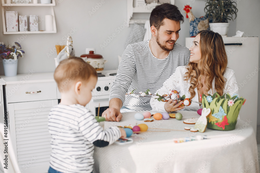 Family with little son in a kitchen