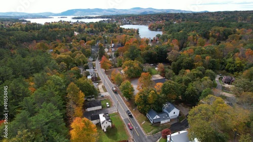 Wolfeboro, New Hampshire USA. Aerial View of Colorful Landscape and Traffic in American Countryside, Lakeside Homes and Tree Colors photo