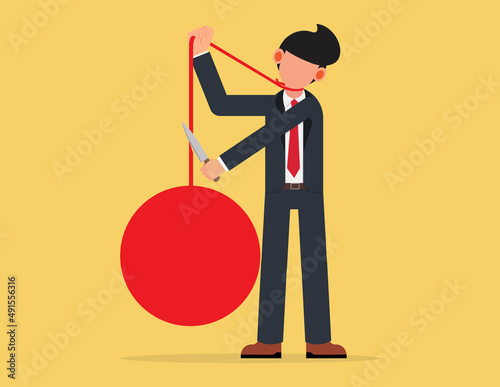 Businessman paying off his debts.businessman cut rope with knife,responsibilities concept